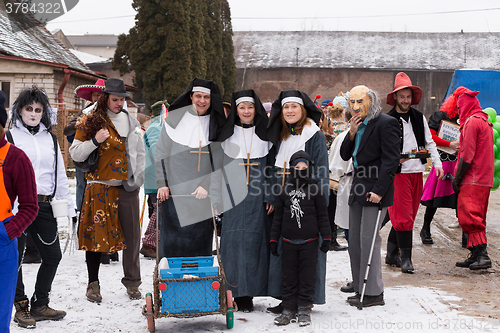 Image of People attend the Masopust Carnival