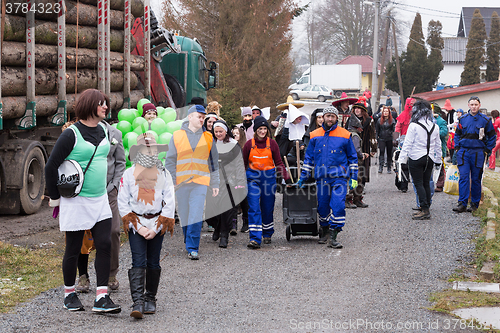 Image of People attend the Masopust Carnival