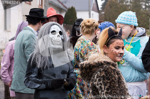 Image of People attend the Masopust Carnival