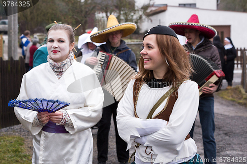 Image of People attend the Masopust Carnival