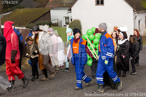 Image of People attend the Masopust Carnival