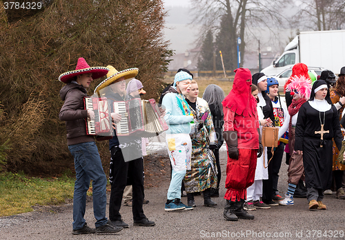 Image of People attend the Masopust Carnival