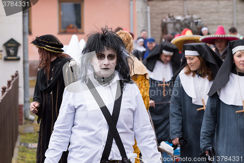 Image of People attend the Masopust Carnival