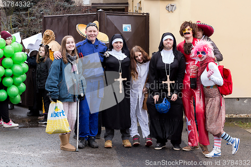 Image of People attend the Masopust Carnival