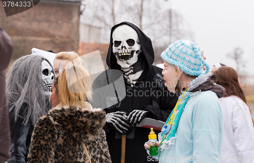 Image of People attend the Masopust Carnival