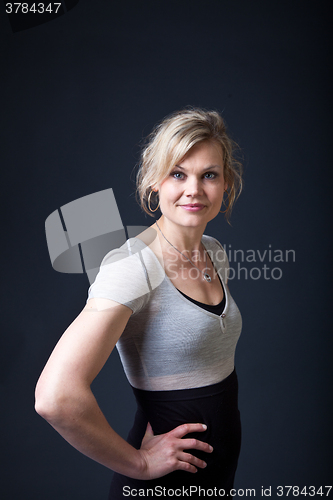 Image of Cute blond girl shot in studio