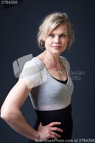 Image of Cute blond girl shot in studio