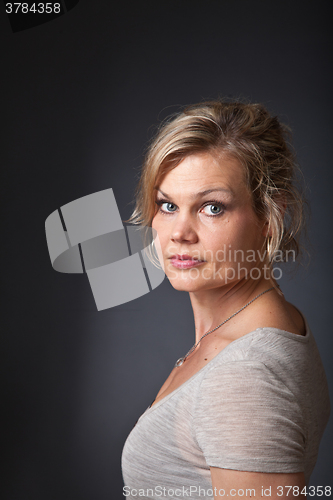 Image of Cute blond girl shot in studio