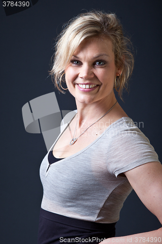 Image of Cute blond girl shot in studio
