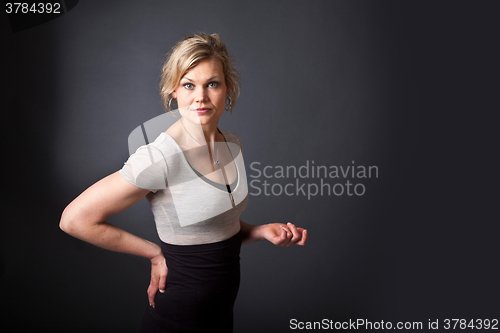 Image of Cute blond girl shot in studio