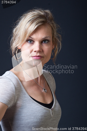 Image of Cute blond girl shot in studio