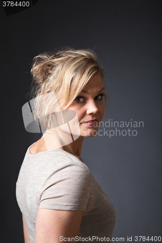 Image of Cute blond girl shot in studio