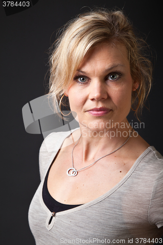 Image of Cute blond girl shot in studio