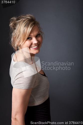 Image of Cute blond girl shot in studio