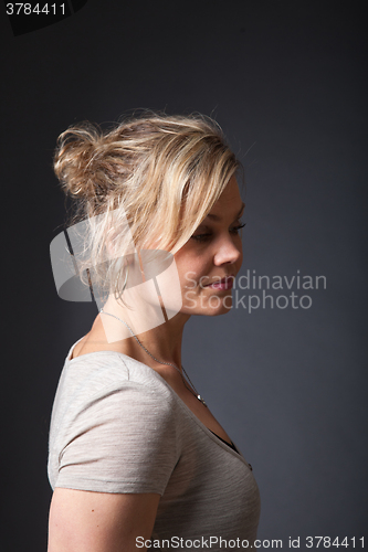 Image of Cute blond girl shot in studio