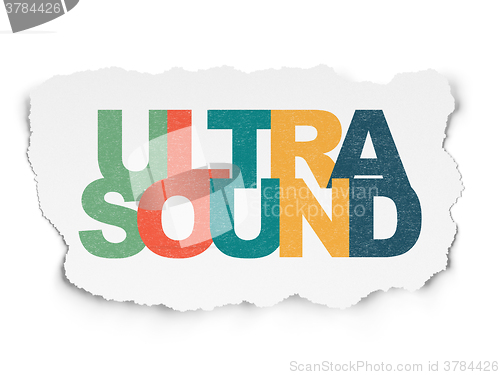 Image of Medicine concept: Ultrasound on Torn Paper background