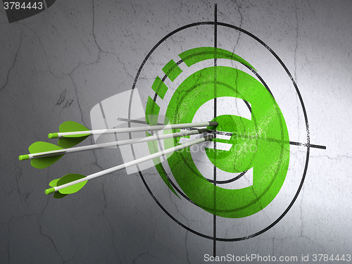 Image of Money concept: arrows in Euro Coin target on wall background