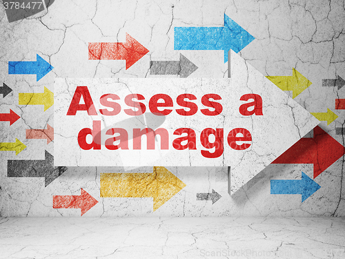 Image of Insurance concept: arrow with Assess A Damage on grunge wall background