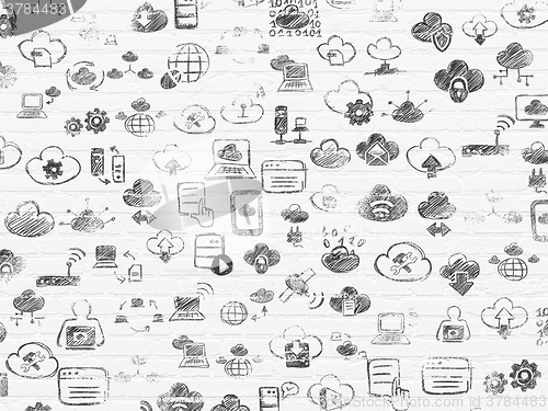 Image of Grunge background: White Brick wall texture with Painted Hand Drawn Cloud Technology Icons