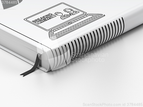 Image of News concept: closed book, Breaking News On Laptop on white background