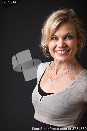 Image of Cute blond girl shot in studio