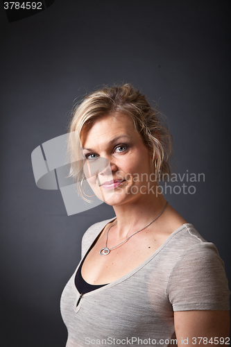 Image of Cute blond girl shot in studio