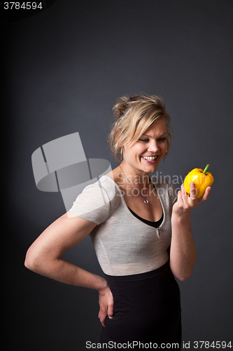 Image of Cute blond girl shot in studio