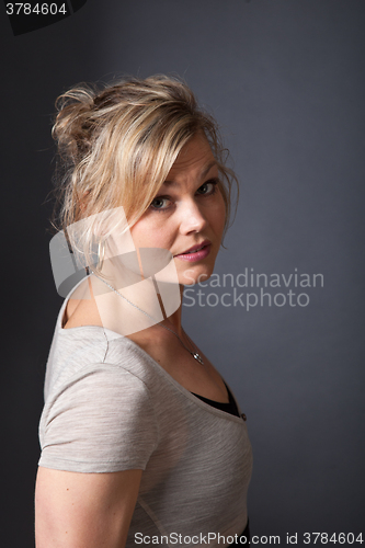 Image of Cute blond girl shot in studio