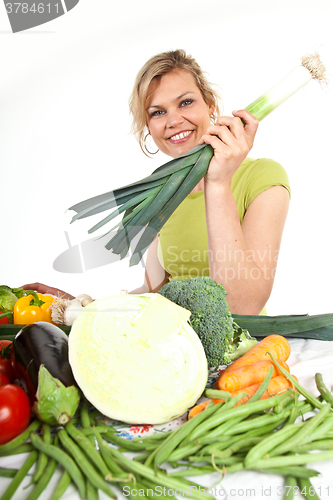 Image of Cute blond girl shot in studio