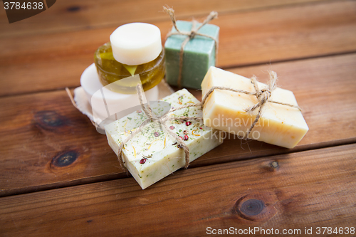 Image of close up of handmade soap bars on wood