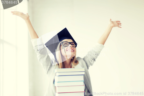 Image of happy student in graduation cap