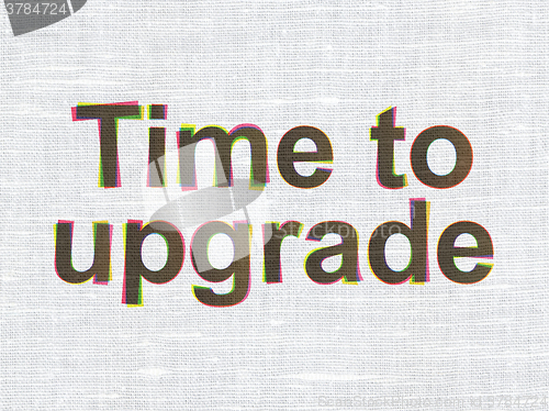 Image of Time concept: Time To Upgrade on fabric texture background