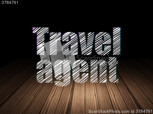 Image of Travel concept: Travel Agent in grunge dark room