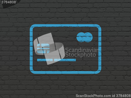 Image of Currency concept: Credit Card on wall background