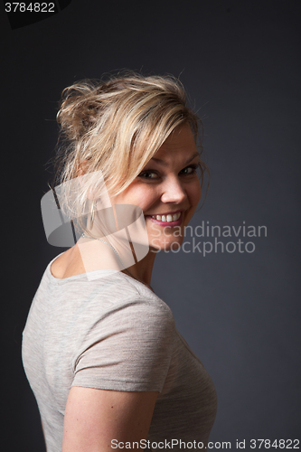 Image of Cute blond girl shot in studio