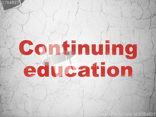 Image of Learning concept: Continuing Education on wall background