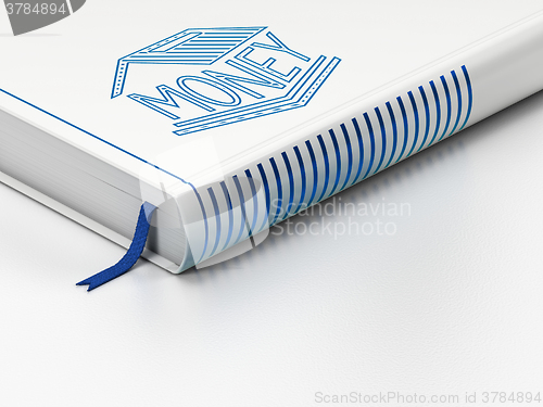 Image of Currency concept: closed book, Money Box on white background