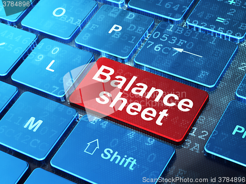 Image of Money concept: Balance Sheet on computer keyboard background