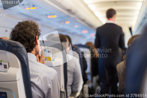 Image of Passengers on the airplane.