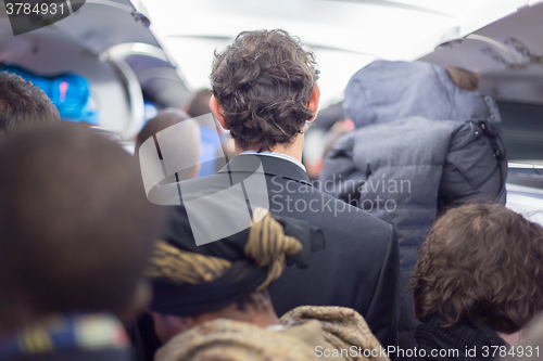 Image of Peoplle disebarking the airplane.