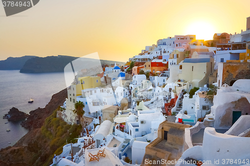 Image of Oia village on Santorini in sunset, Greece.