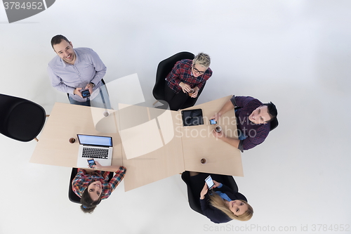 Image of aerial view of business people group on meeting