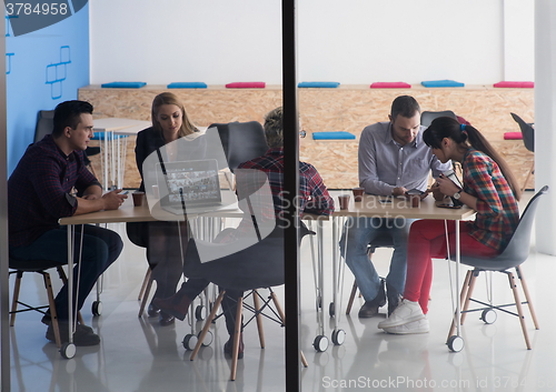 Image of startup business team on meeting at modern office