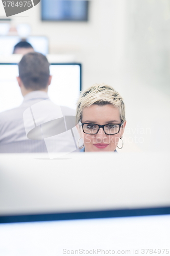 Image of startup business, woman  working on desktop computer