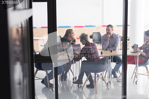 Image of startup business team on meeting at modern office