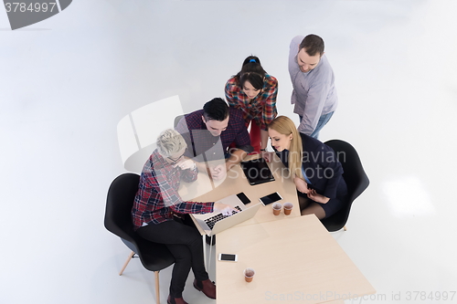 Image of aerial view of business people group on meeting