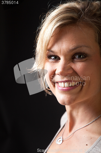Image of Cute blond girl shot in studio