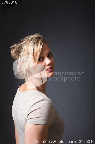 Image of Cute blond girl shot in studio
