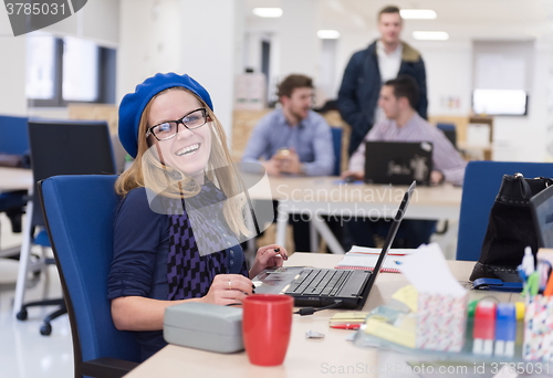 Image of startup business, woman  working on laptop