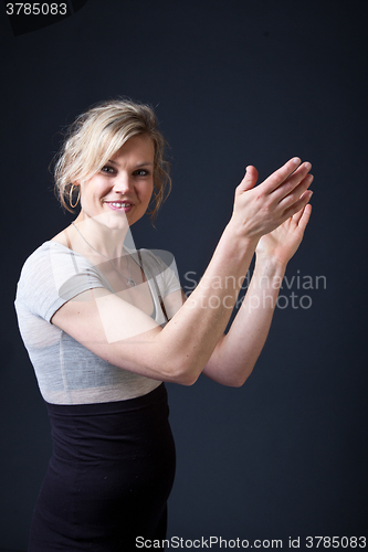 Image of Cute blond girl shot in studio